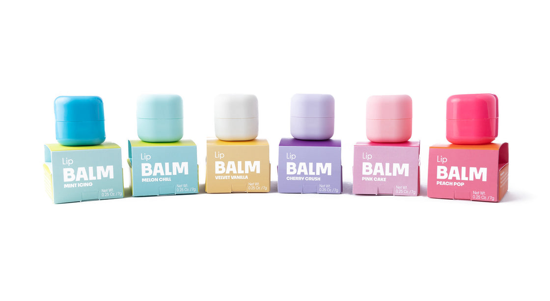 Set of colorful lip balm shea & tallow boxes on a white background
